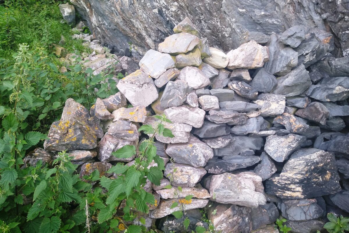 Stone wall outside cave